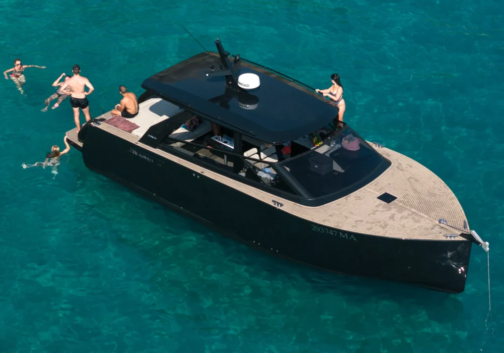 Drone view of Colnago 38 OPEN luxury yacht in crystal clear sea