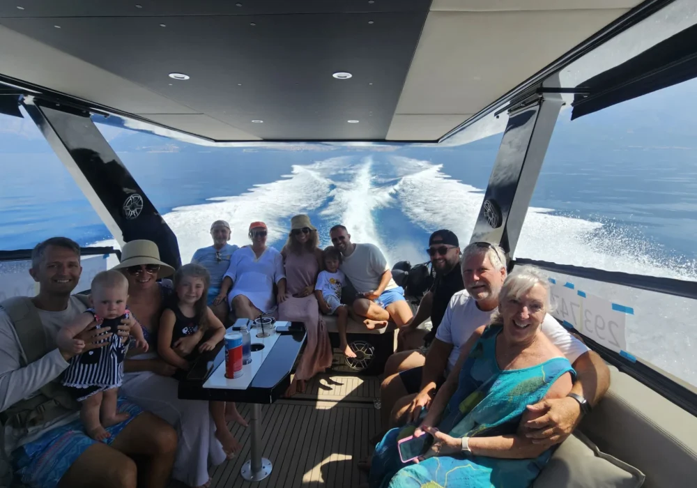 Guests enjoying the covered deck area on Colnago 38 OPEN luxury boat