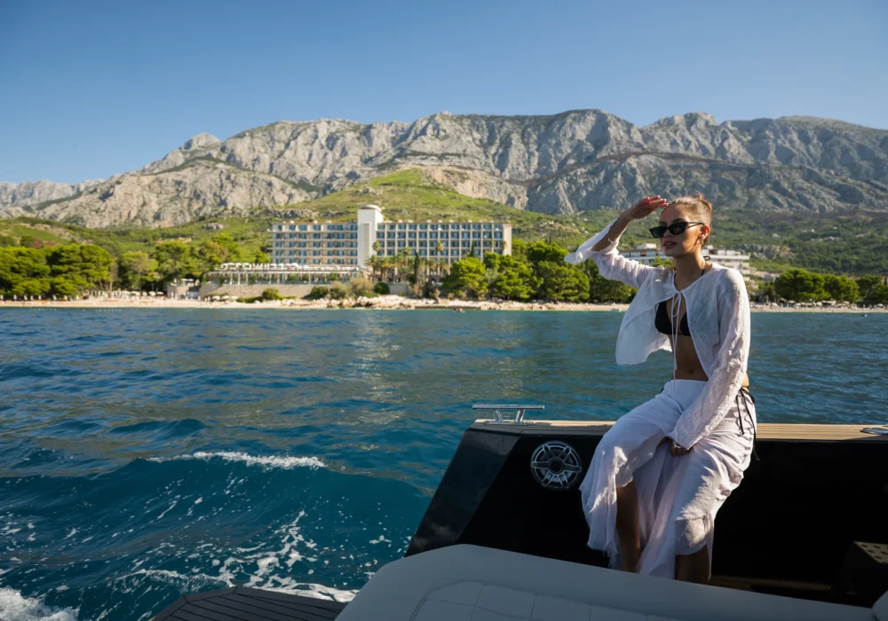 Woman enjoying the sea view from Colnago 38 OPEN in Makarska